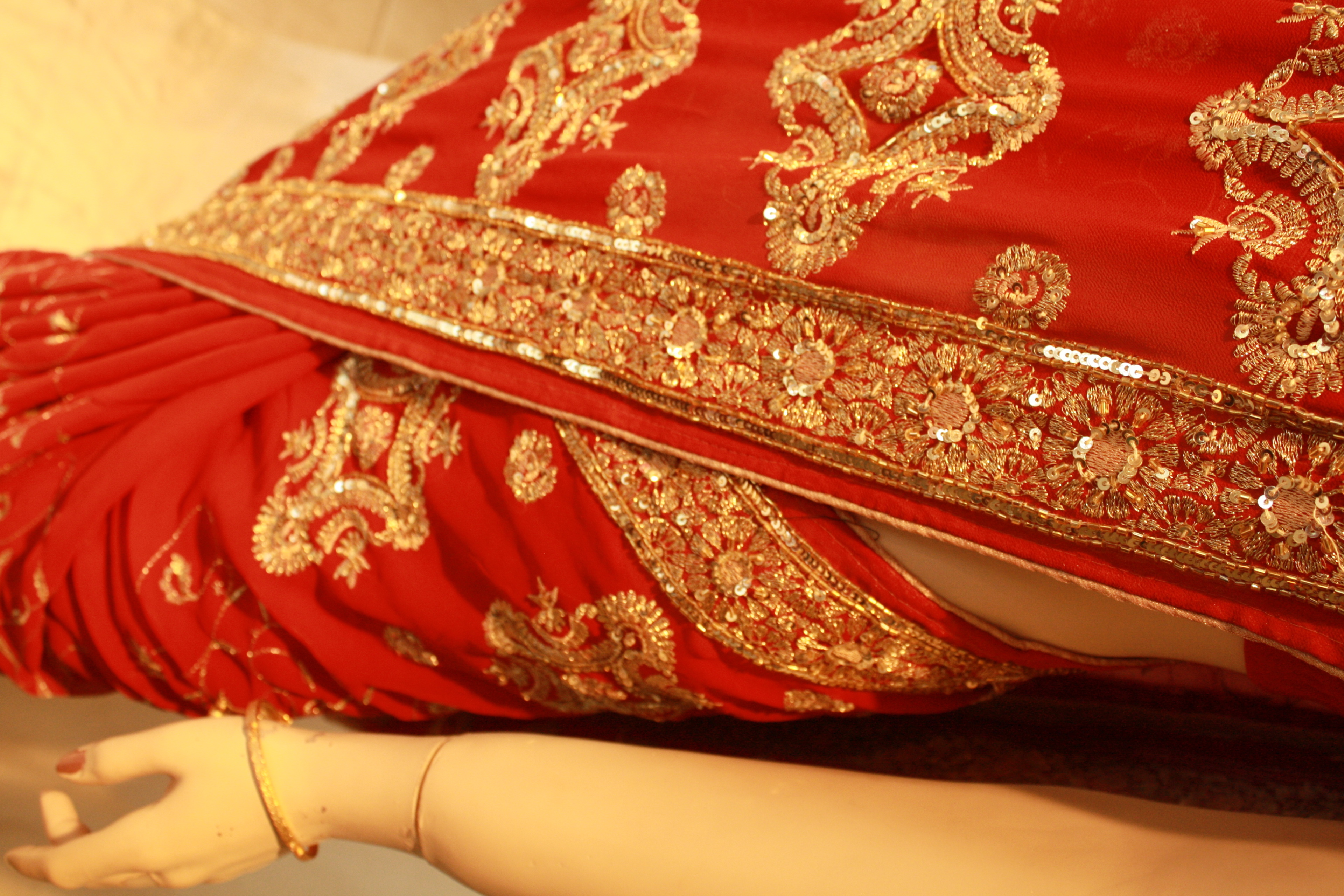 Bright red saree with gold embroidery- bridal party collection